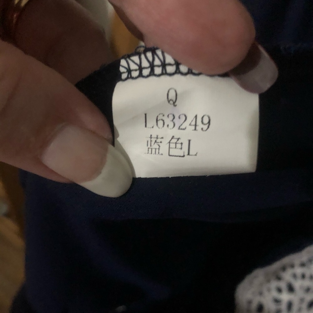 Navy blue dress with white lace trim